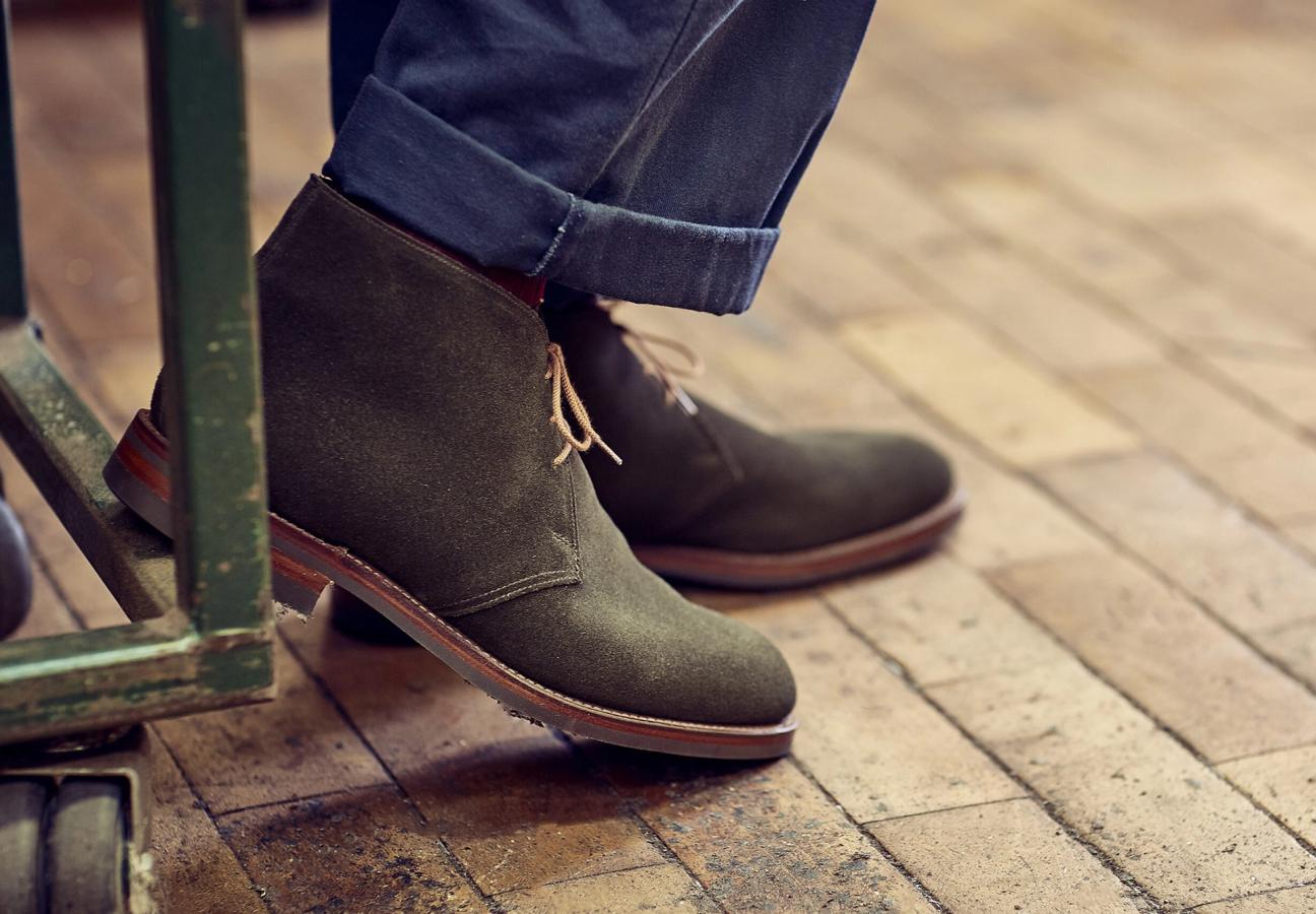 Man wearing Crockett & Jones’s Earth Green Suede chukka boot