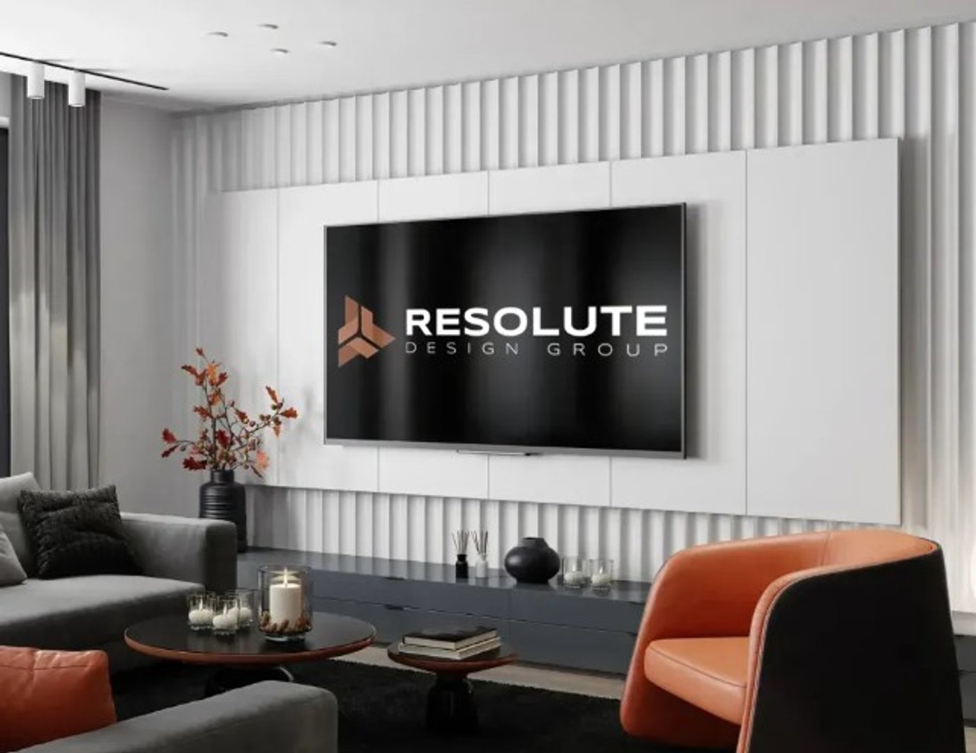A wall-mounted television showing the Resolute Design Group logo in a modern living room.