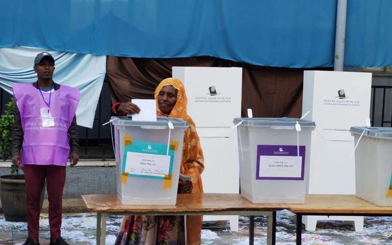 An Ethiopian voter casts a ballot at a polling station during the country's electoral process.