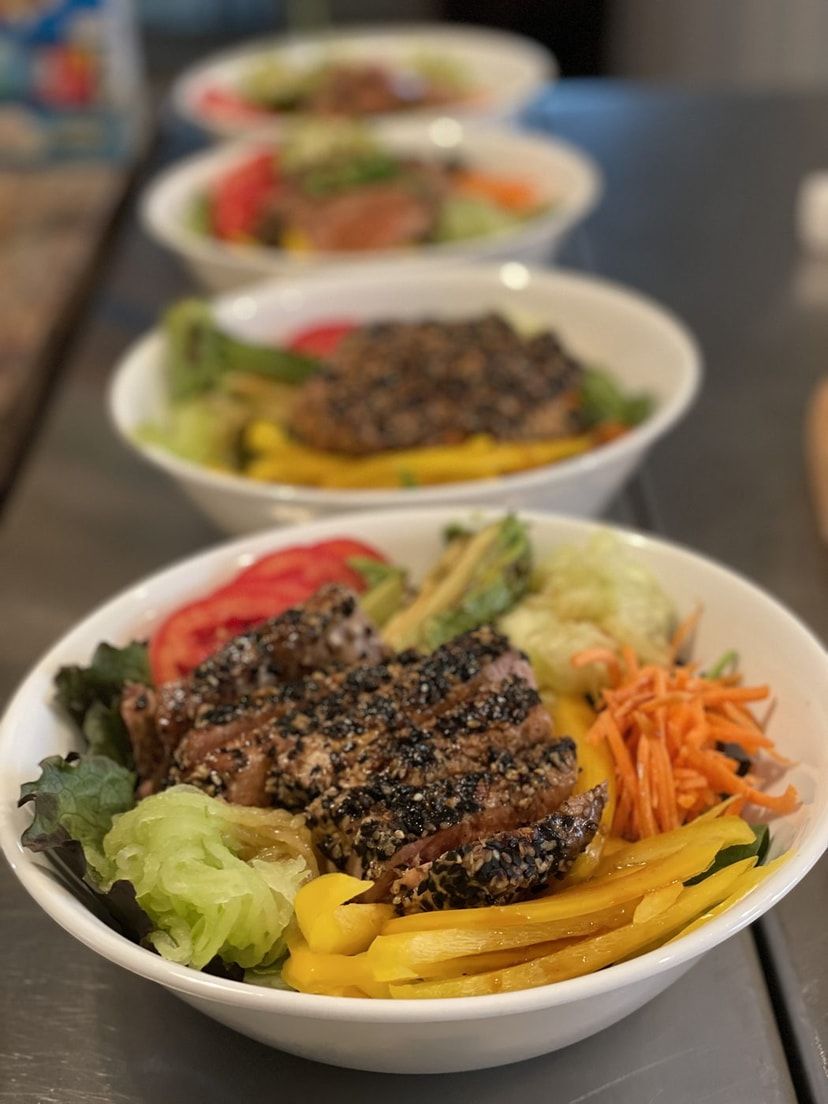 Grain bowls layered with vegetables