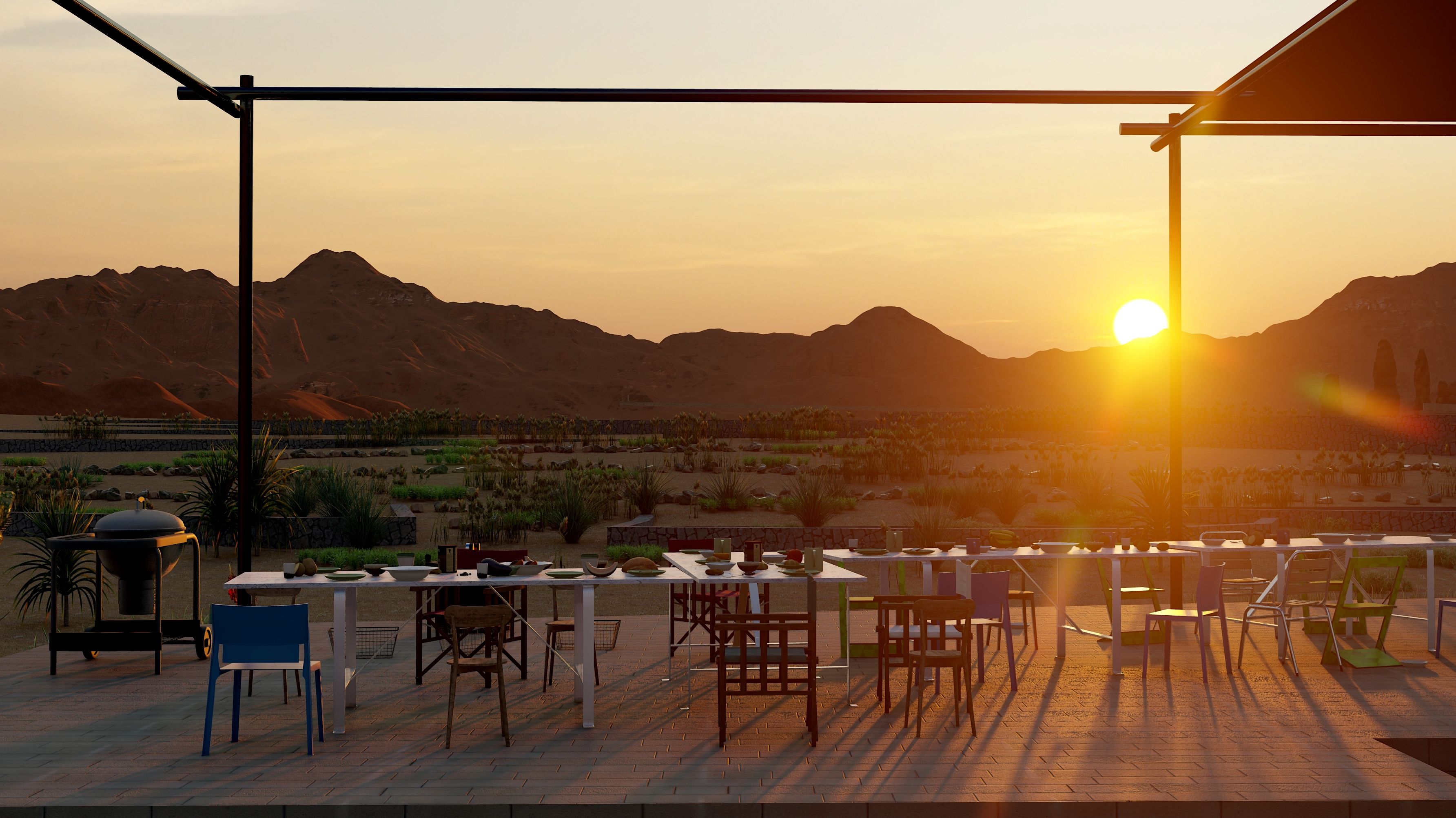 Photograph of tables and chairs on a raised outdoor area, with the sun setting behind low mountains in the background