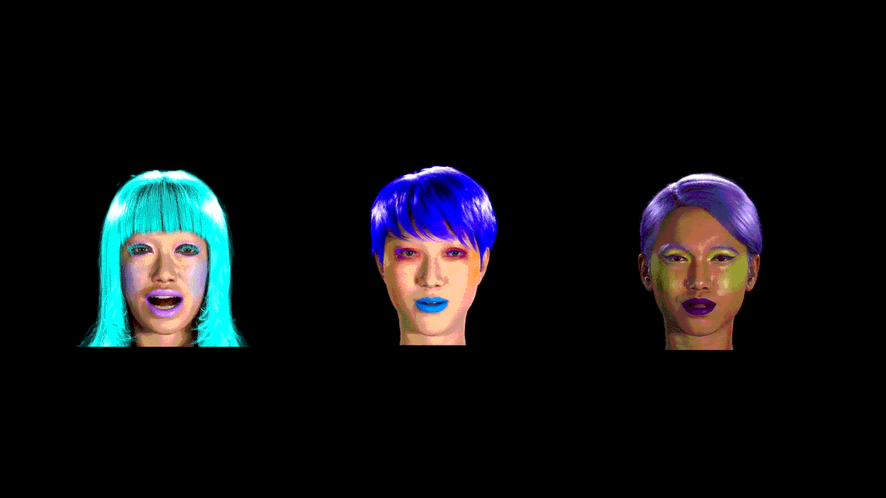 A row of three heads wearing different brightly coloured wigs and make-up. They are looking straight ahead and appear to be talking.