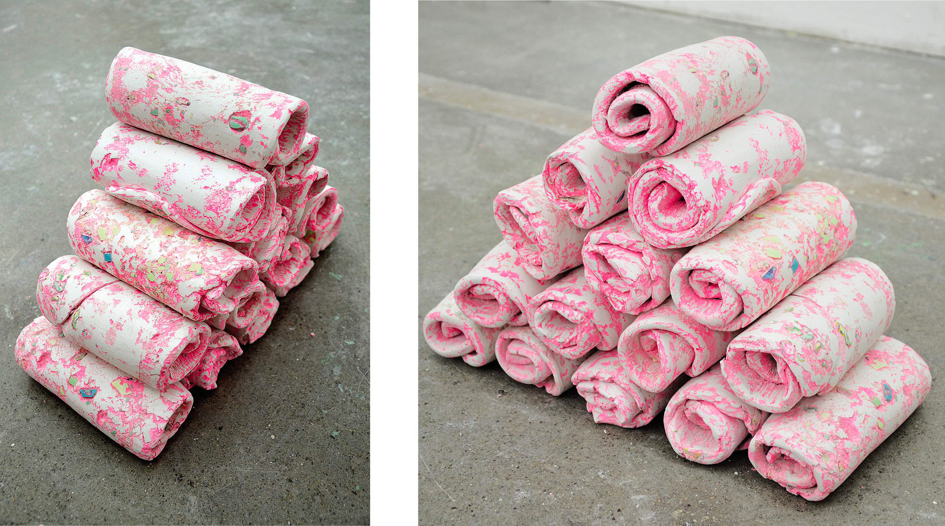 Two photographs of cylindrical rolls of a soft, pink and white material stacked in a pyramid on a concrete floor, taken from different angles.