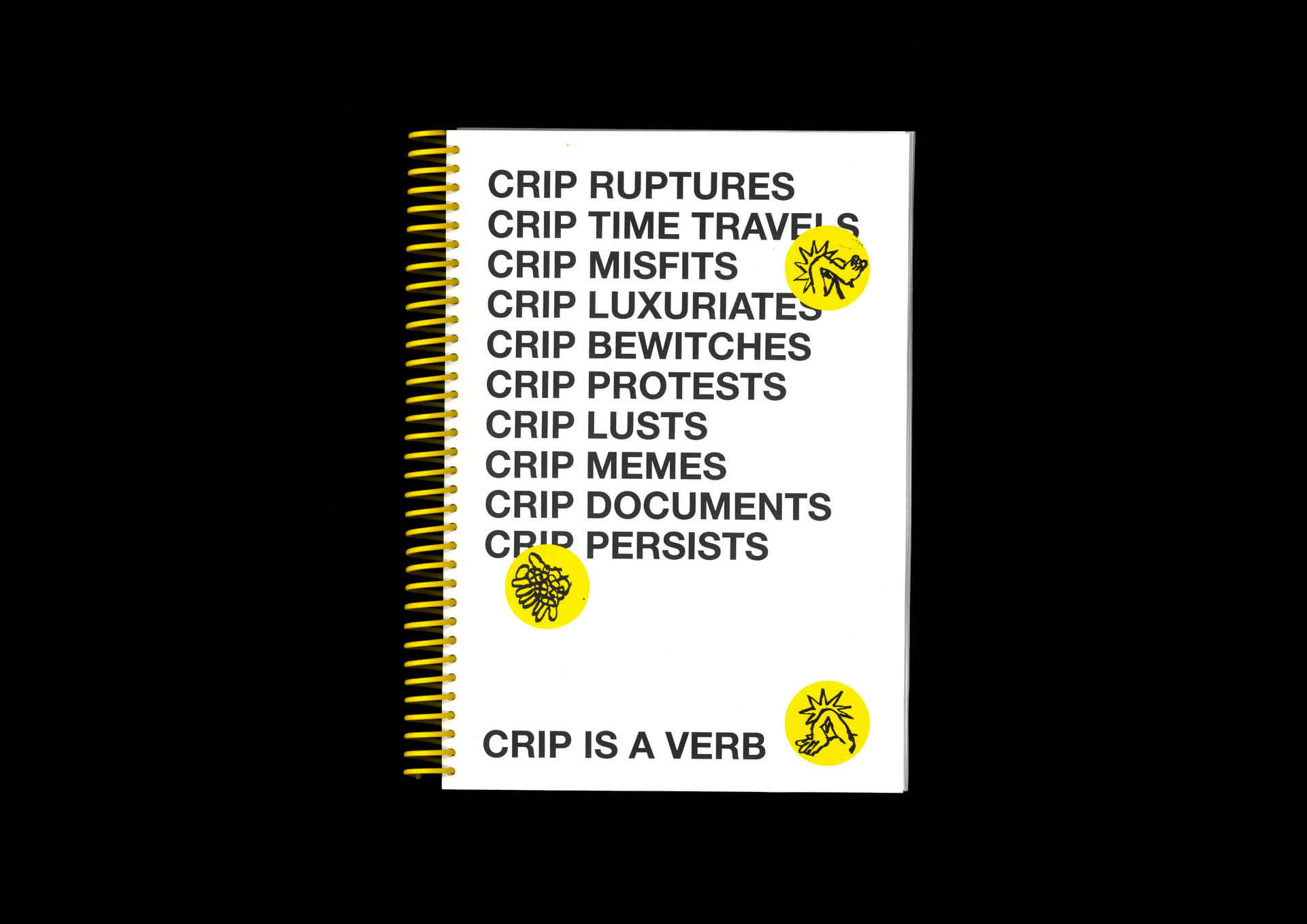 Image of a spiral bound notebook with black text on a white background, and three small round yellow stickers with images stuck on it, on a black background.