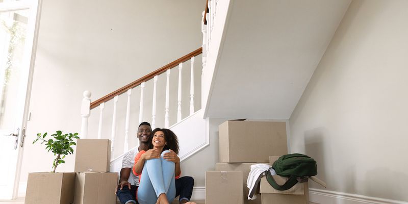 Couple moving in to new house.