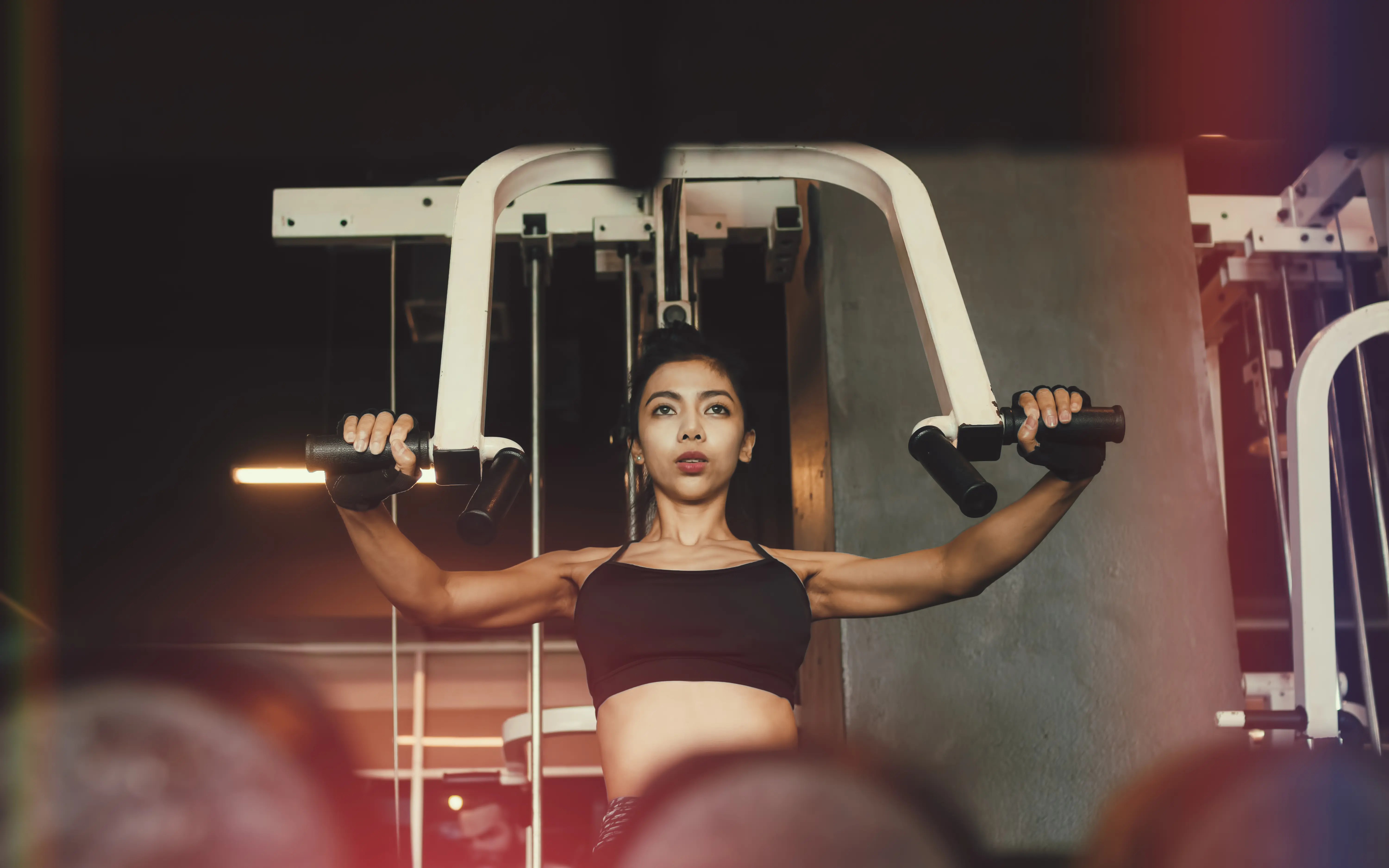 sporty woman bench press