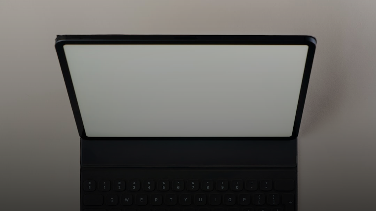 A laptop computer sitting on top of a table