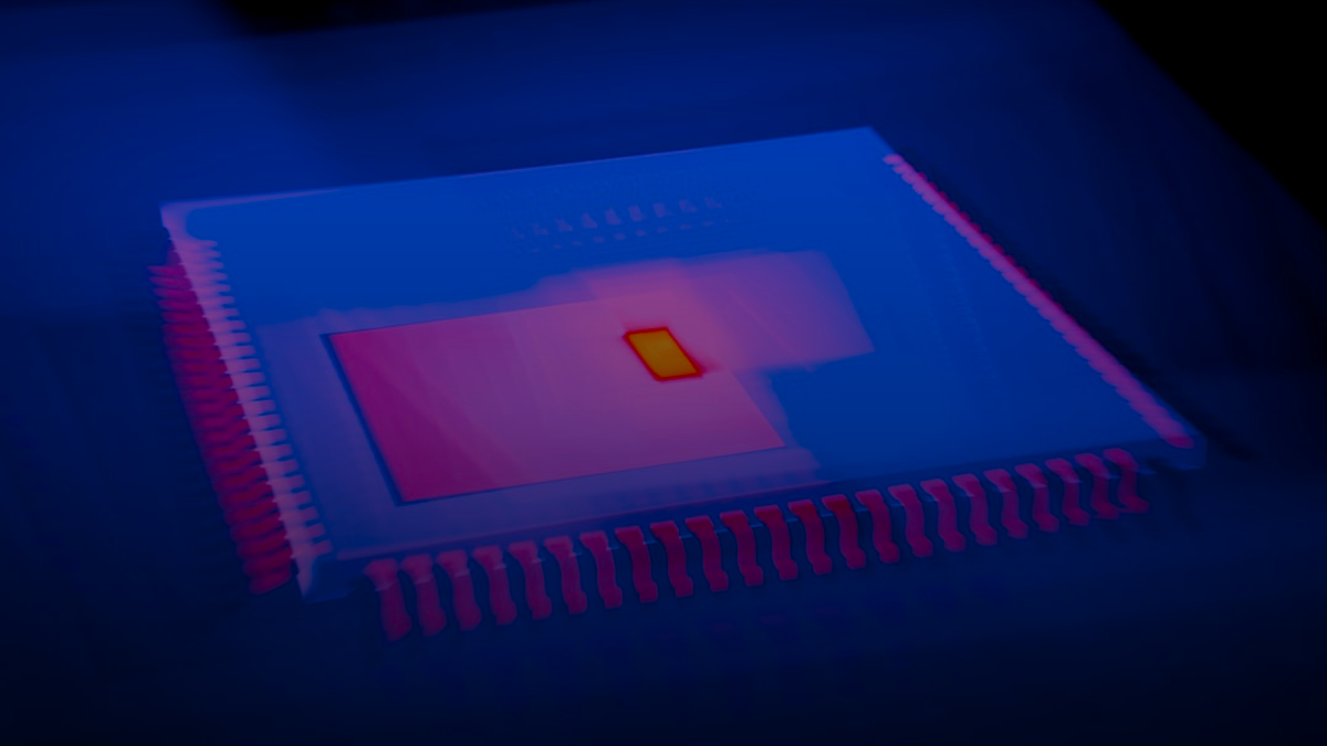 A close up of a computer chip in a dark room