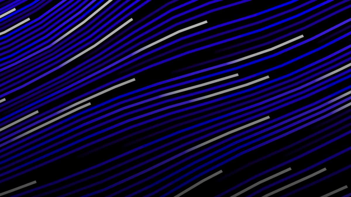 Abstract flowing lines of purple and white on black