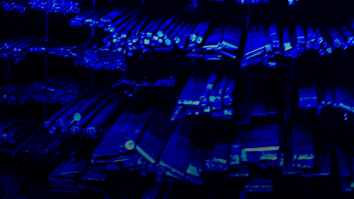 Rows of metal bars illuminated with blue light