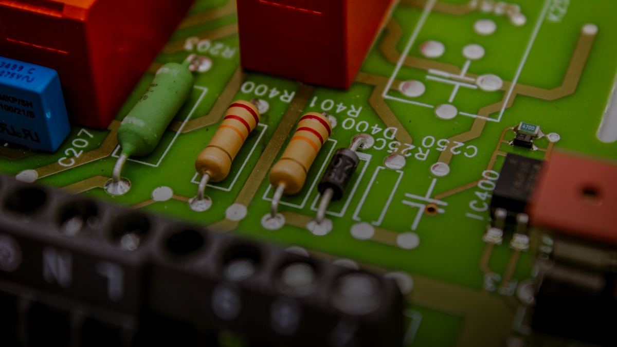 a close up of a circuit board with some electronic components