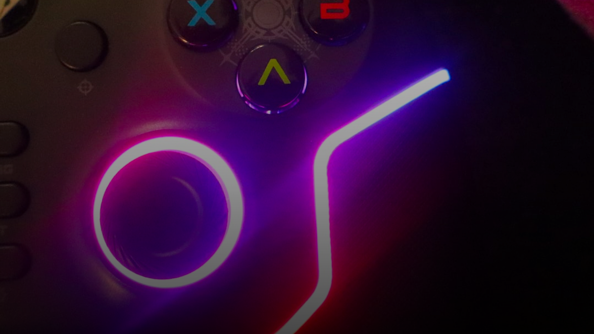 Close-up of a glowing video game controller