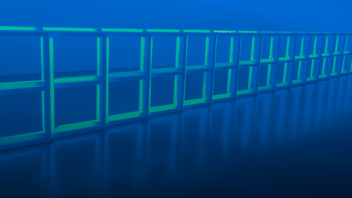 a row of blue shelves sitting on top of a blue floor