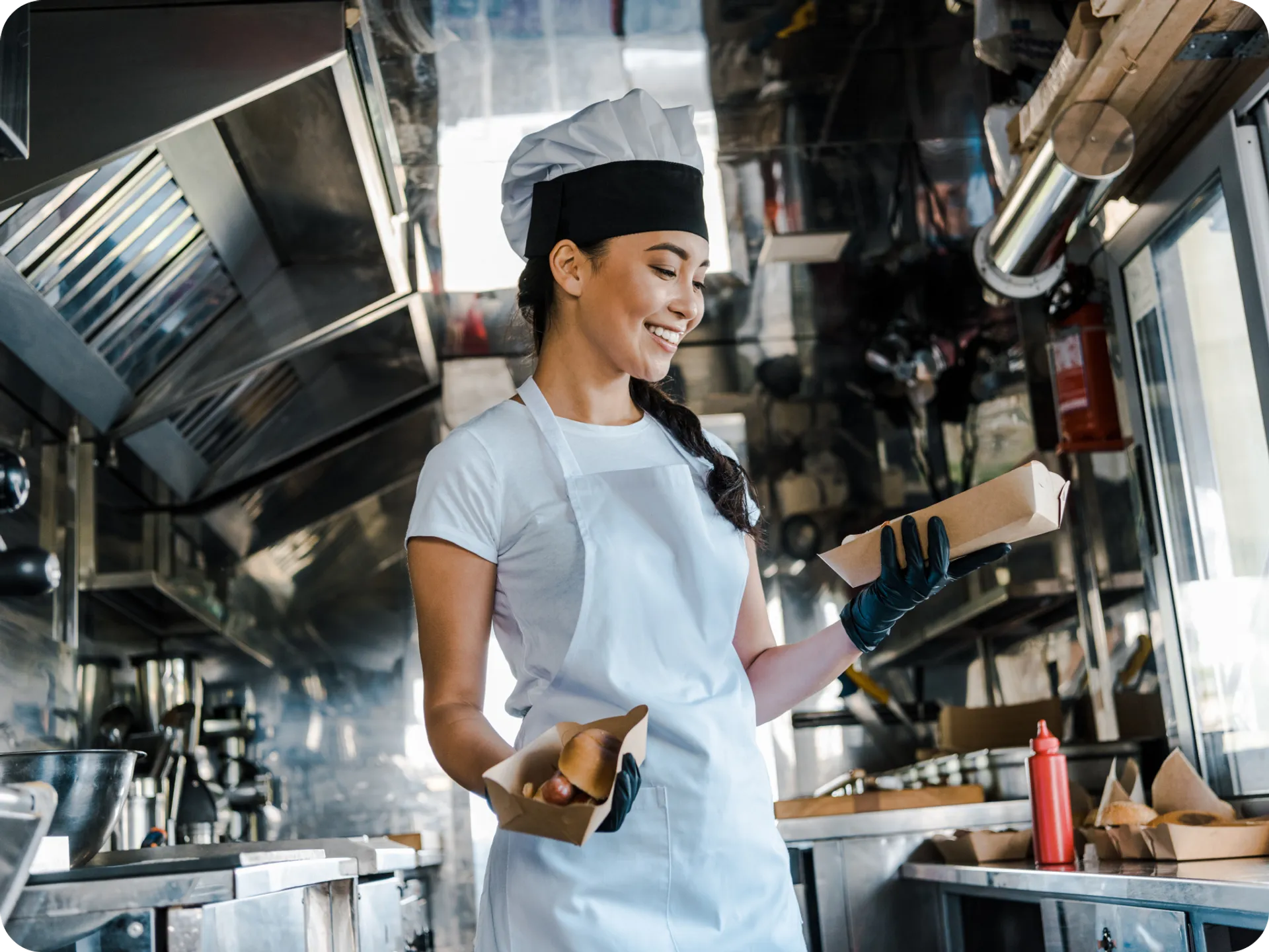 Food truck chef is in the kitchen.