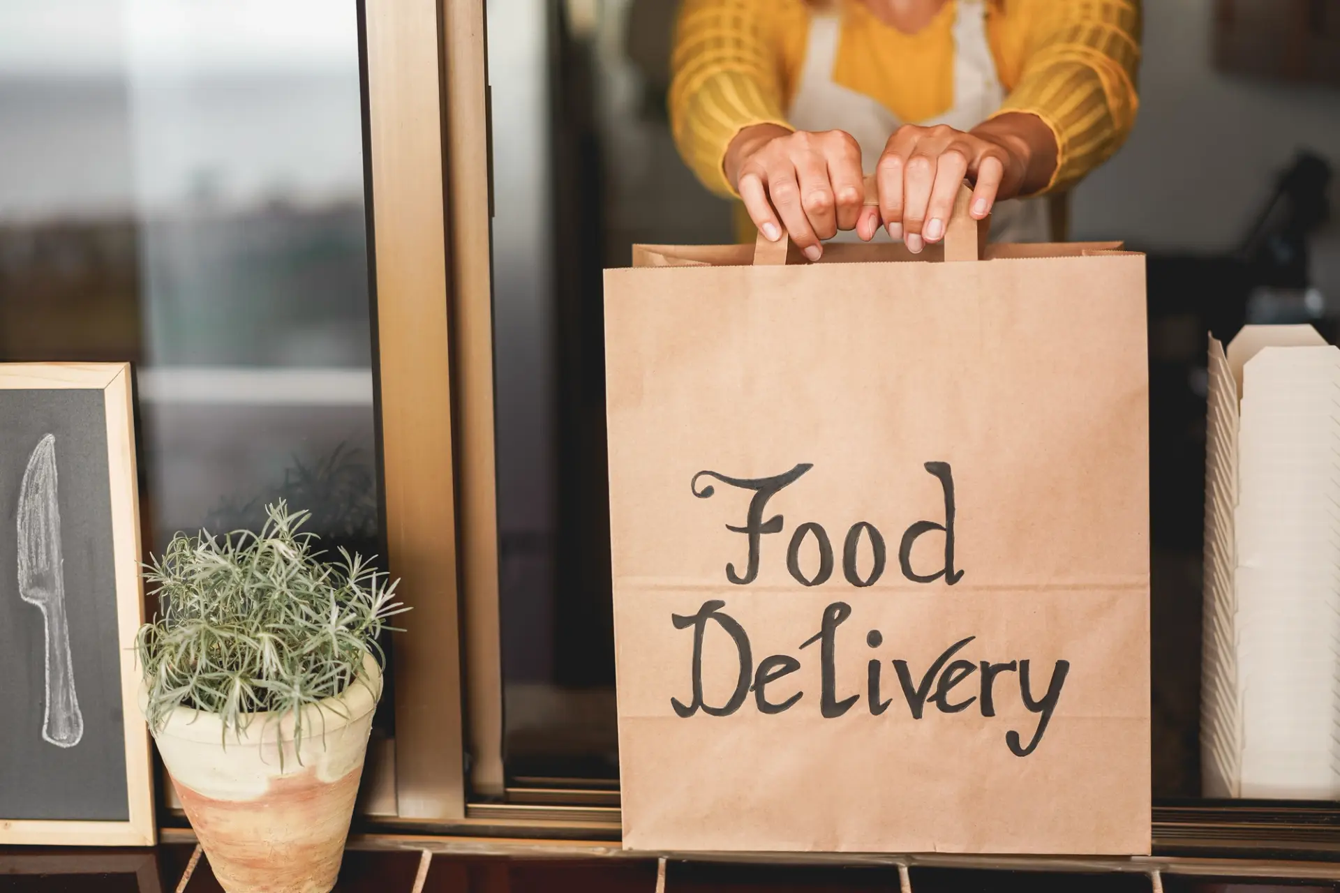 Contactless food delivery from ghost kitchen.