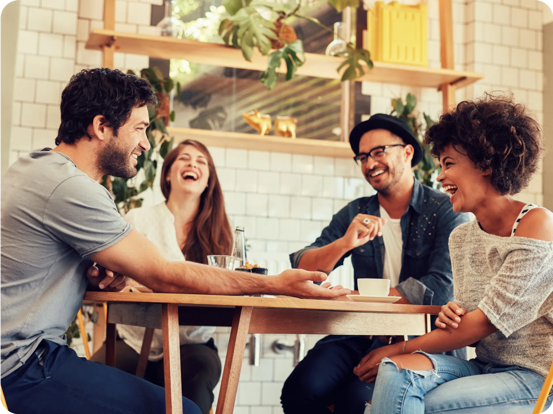 FineDine and Pos Integration: Friends having a good time at a table.