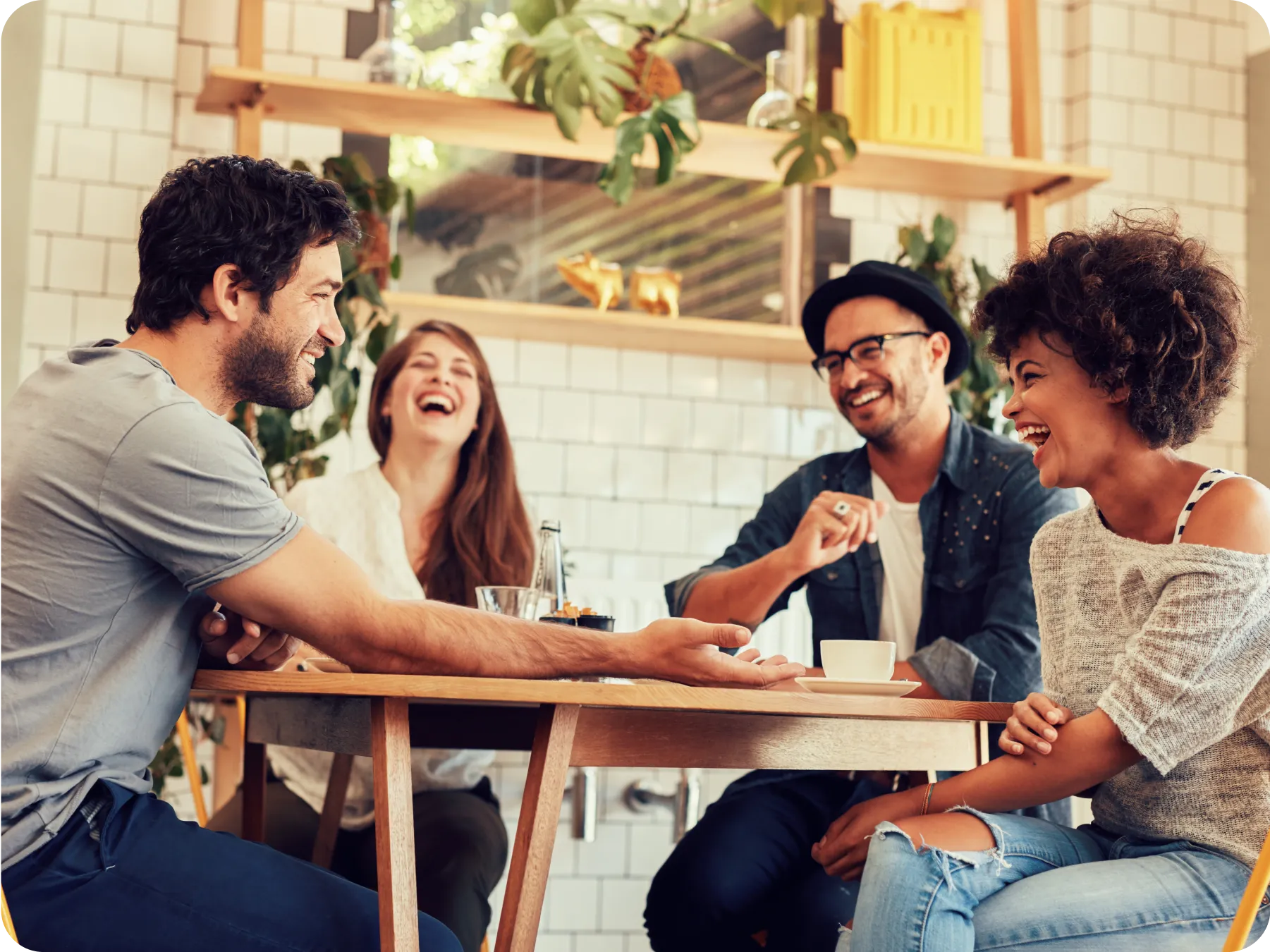 FineDine and Pos Integration: Friends having a good time at a table.