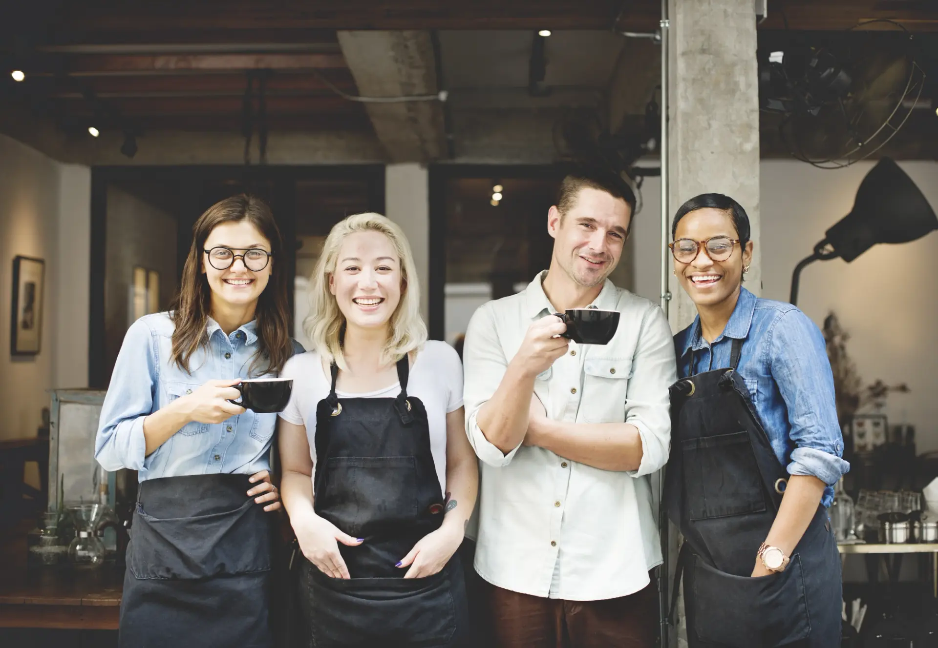 Coffee shop employees using digital ordering.