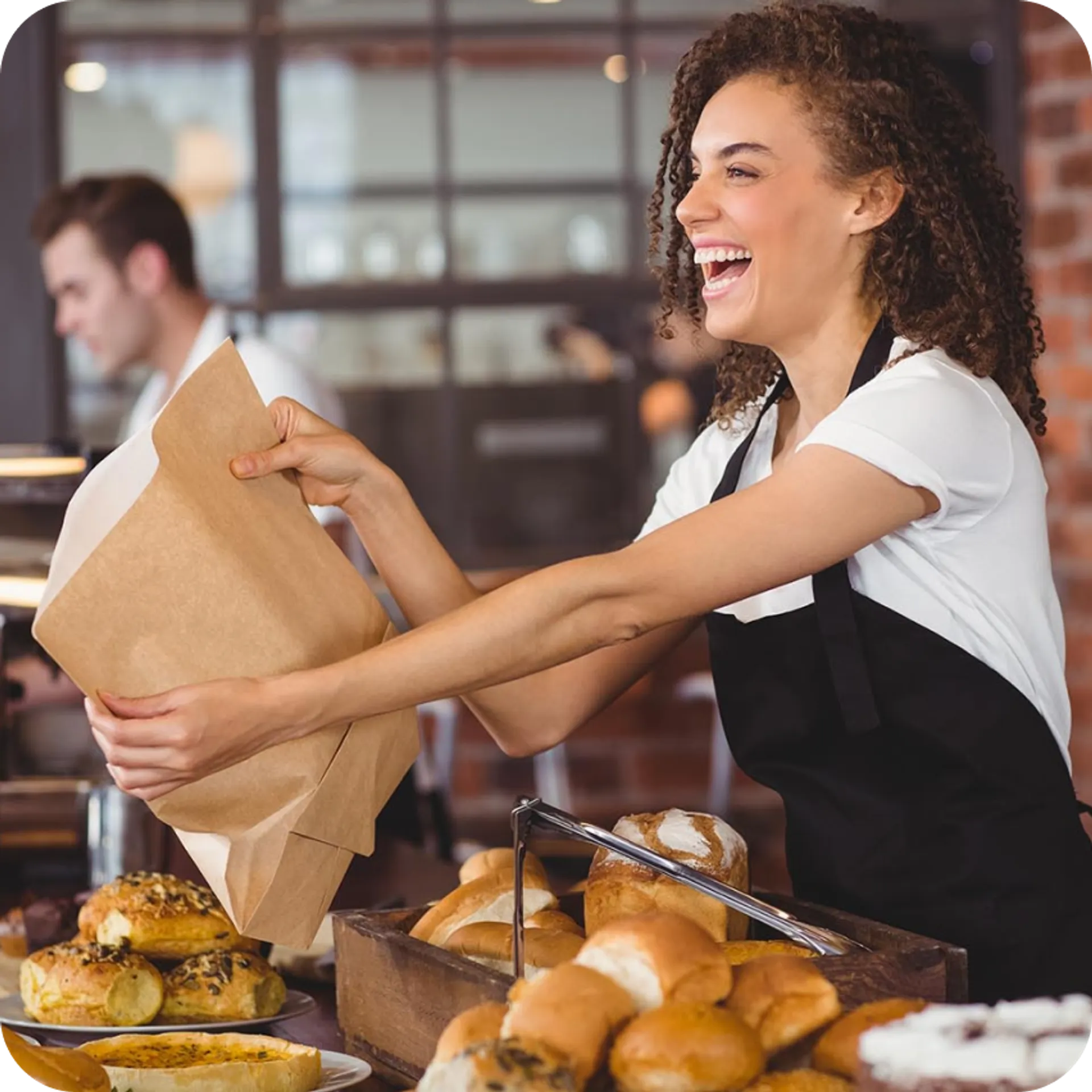 A waiter delivering food.