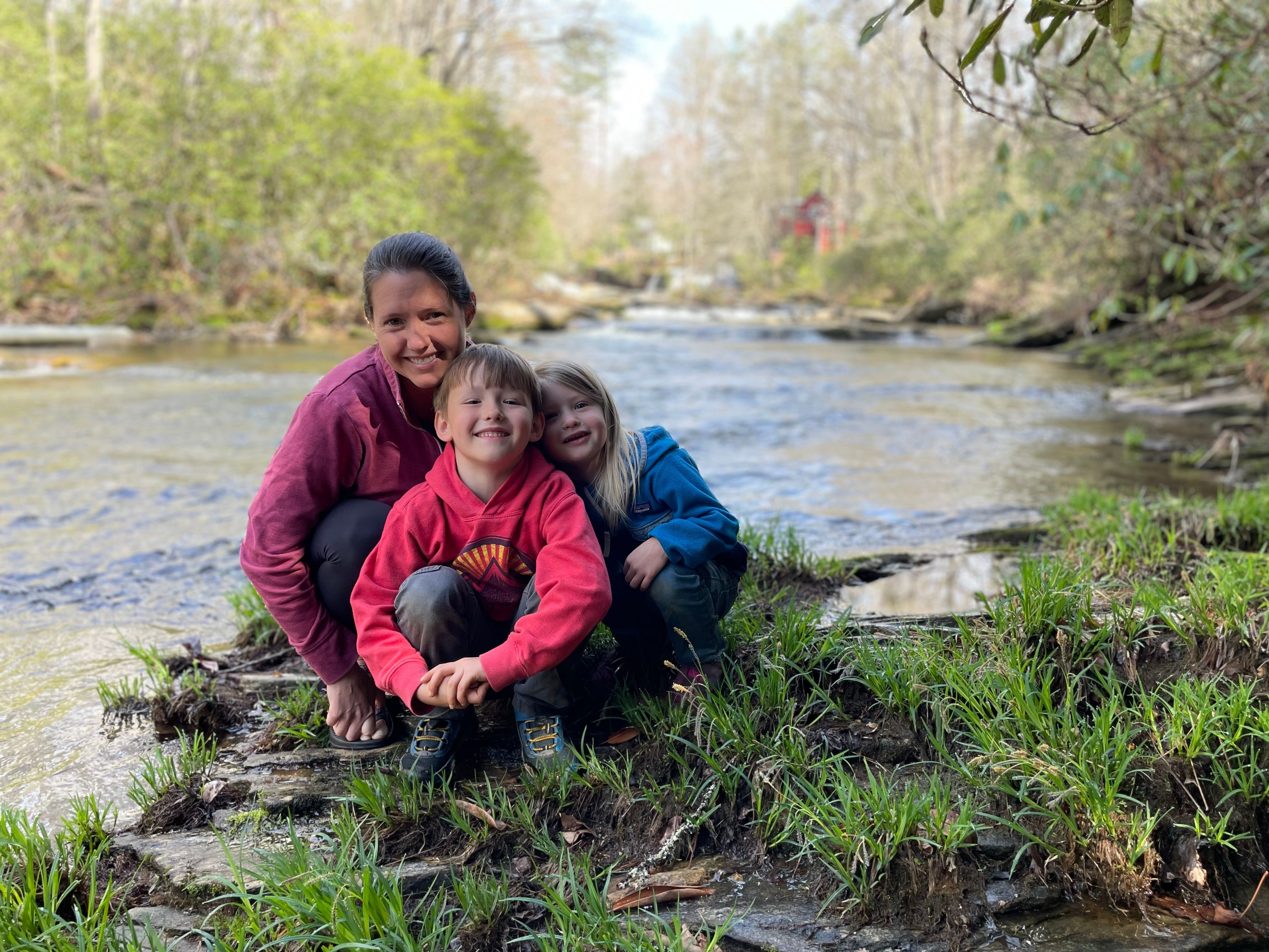 My wife and children by the river