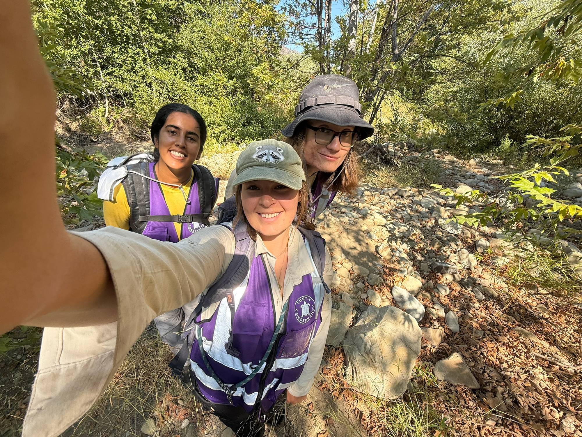 Interns Akshara Reddy and Boris van Neer with Biologist Kylie Rude in the field