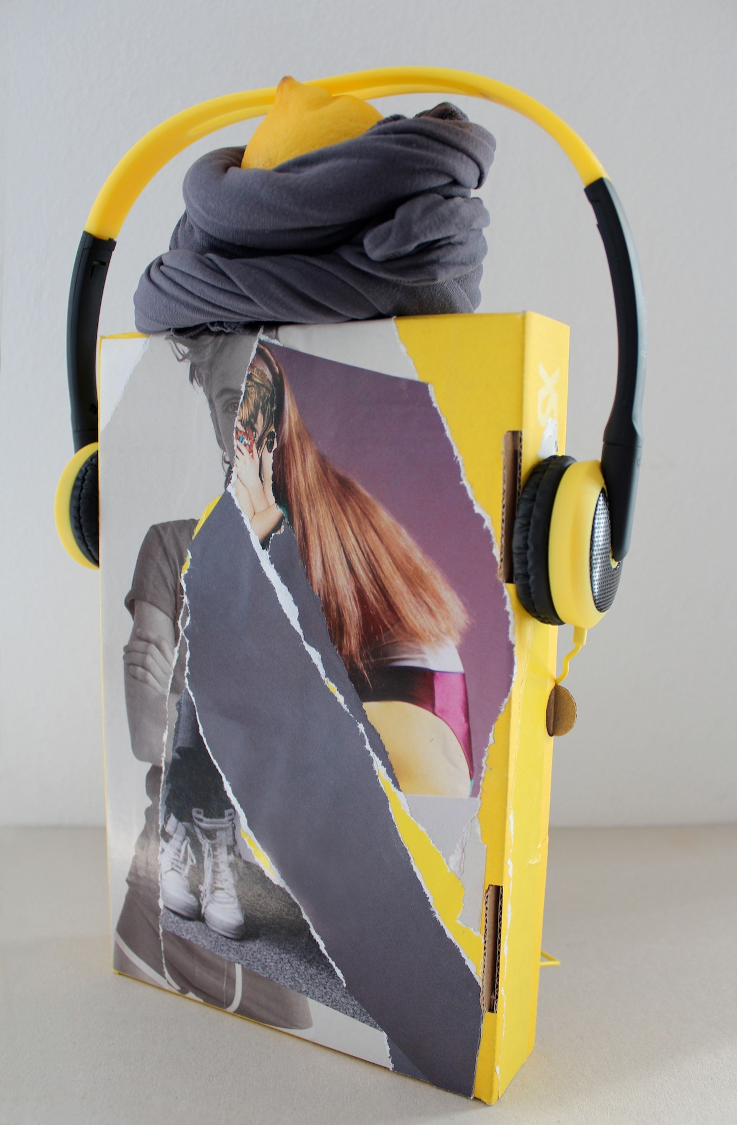Deborah Ligorio, Survival Kit – Researcher Marcella 3/99, 2013, assemblage: kraft bubble envelope, tights, lemon, headphones, 4x17x 32cm.