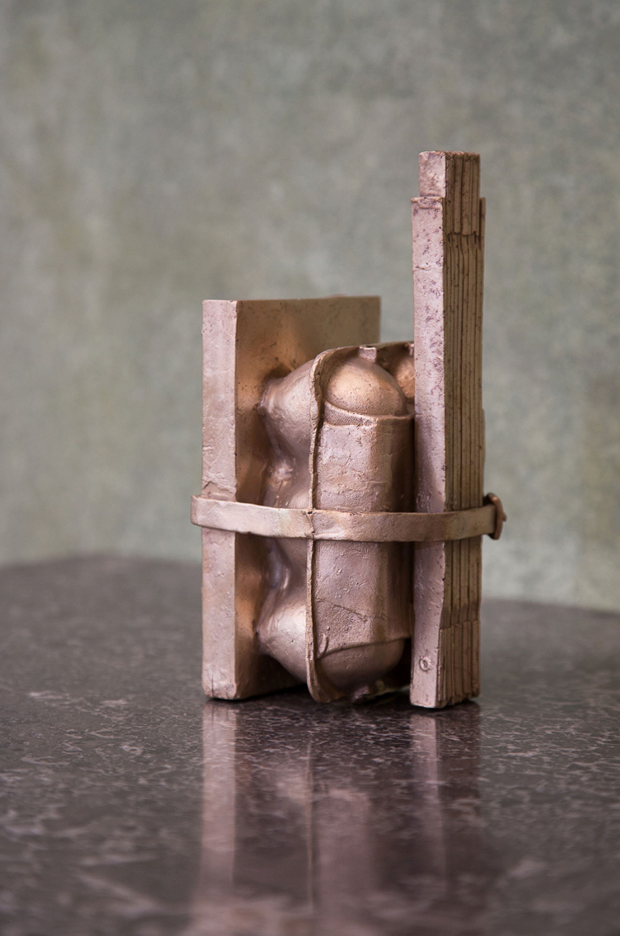 Deborah Ligorio, Survival Kit - The person who kept functioning, 2012, bronze, 22 x 10 x 12 cm.