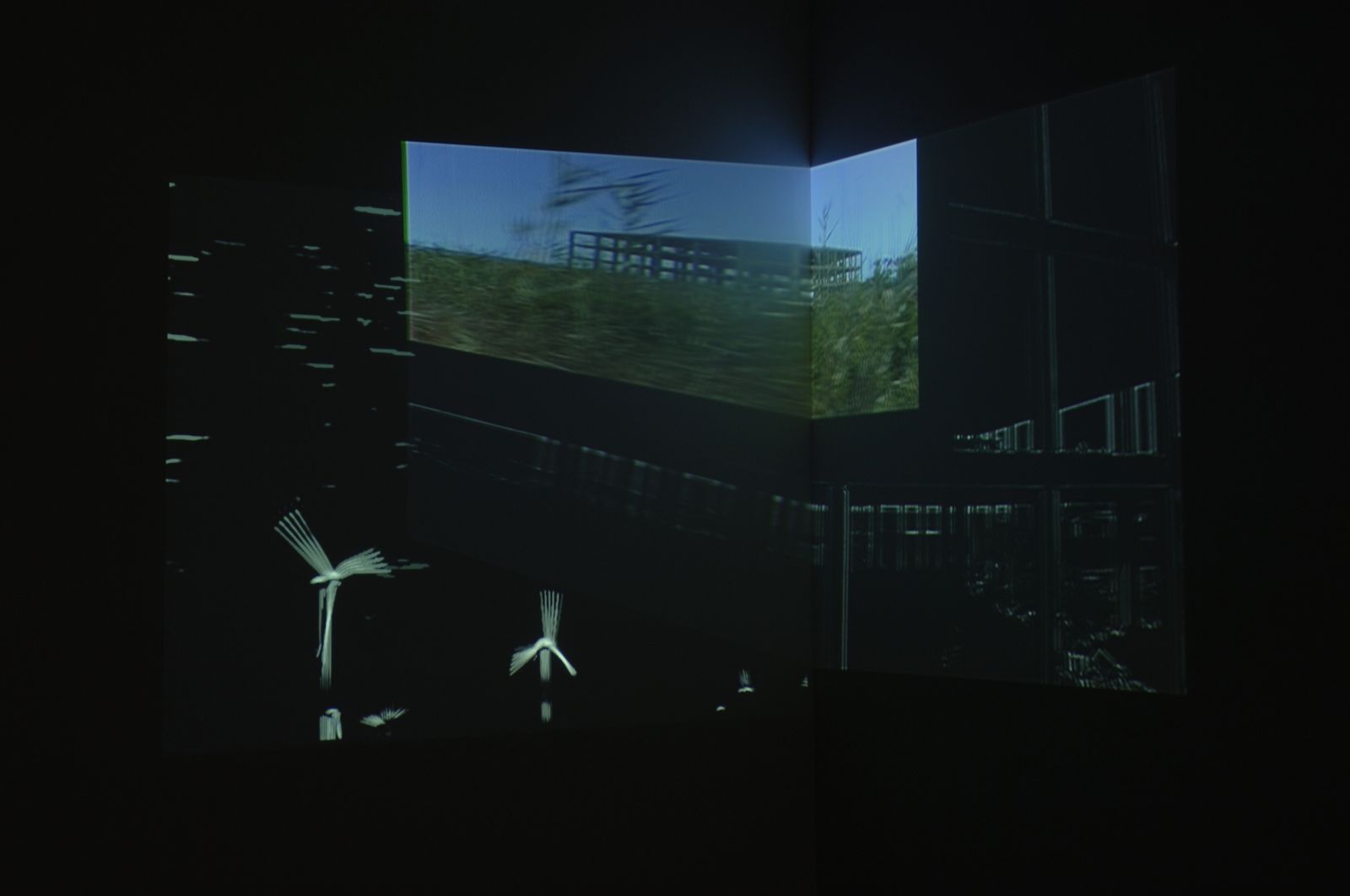 Installation view of Deborah Ligorio’s Irregular Configuration (2005), double-projection video installation.