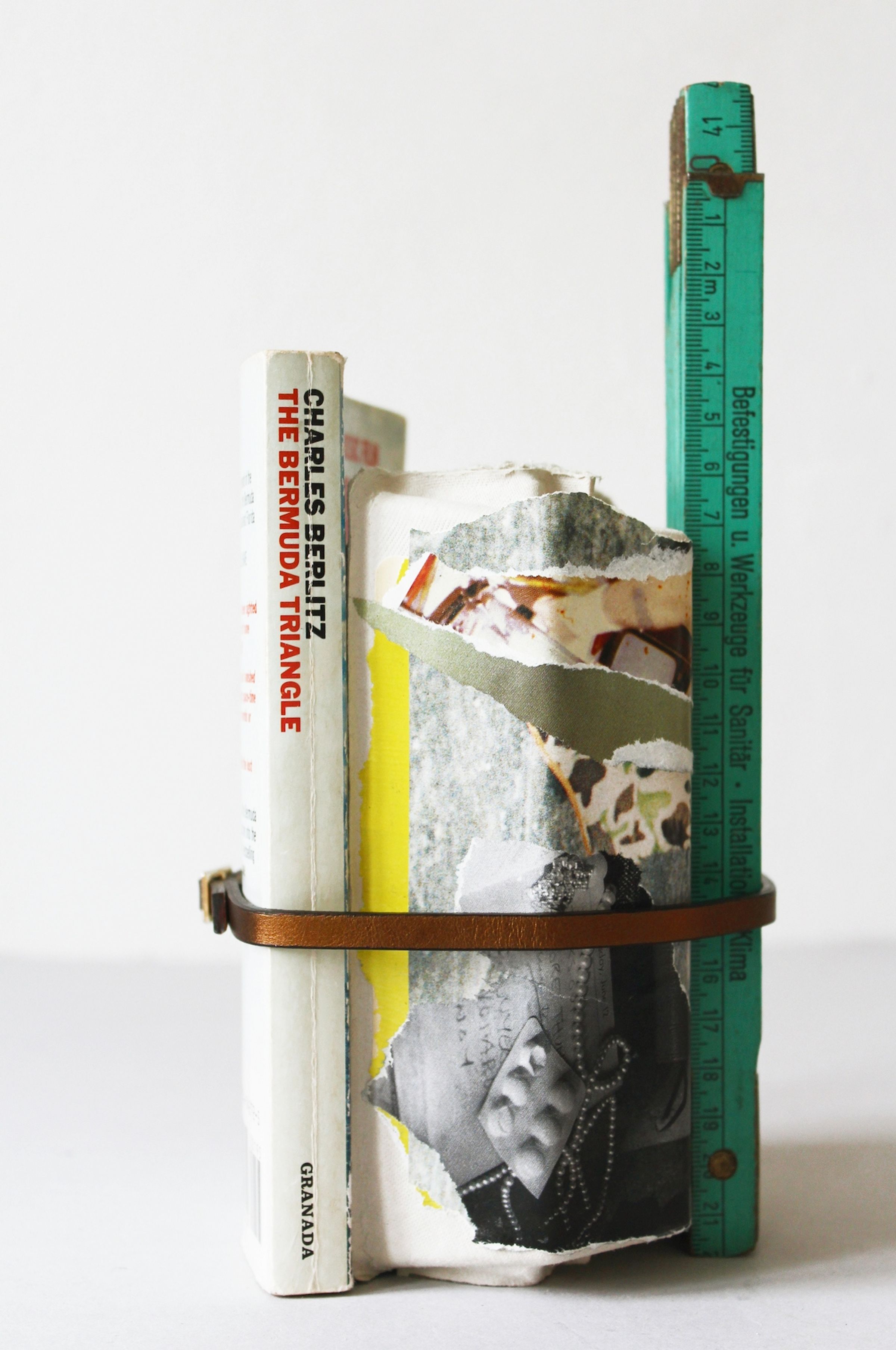 Deborah Ligorio, Survival Kit - The person who kept functioning 1/99, 2012, assemblage: egg box, paper, book, wooden meter, belt, 22 x 10 x 12 cm.