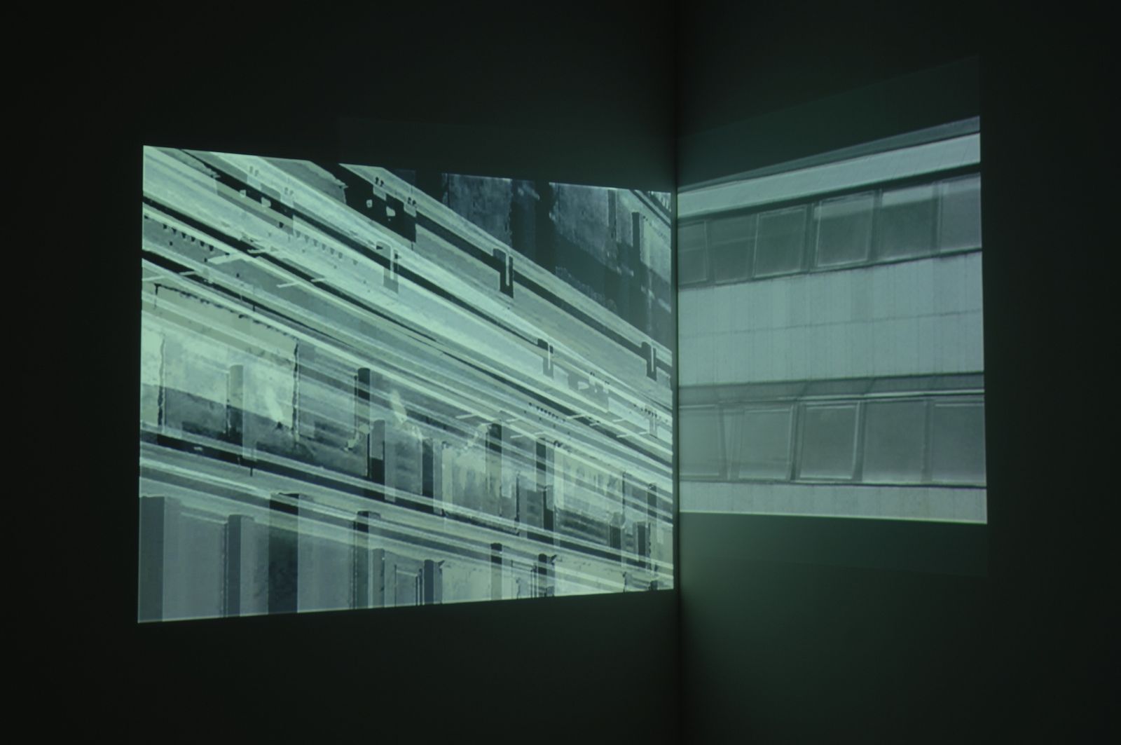 Installation view of Deborah Ligorio’s Irregular Configuration (2005), double-projection video installation.