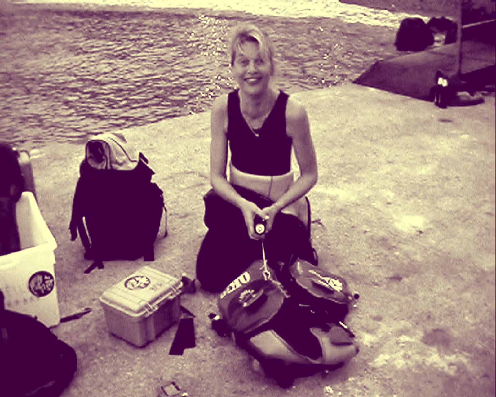Making-of photograph of Deborah Ligorio’s Wired Under Water (1999), showing Katharina Nicolaus preparing underwater equipment.