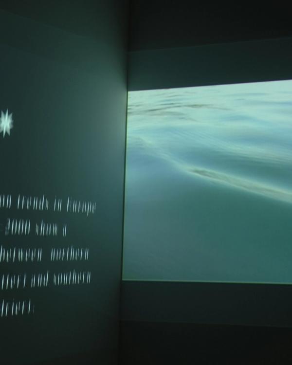 Installation view of Deborah Ligorio’s Irregular Configuration (2005), double-projection video installation.