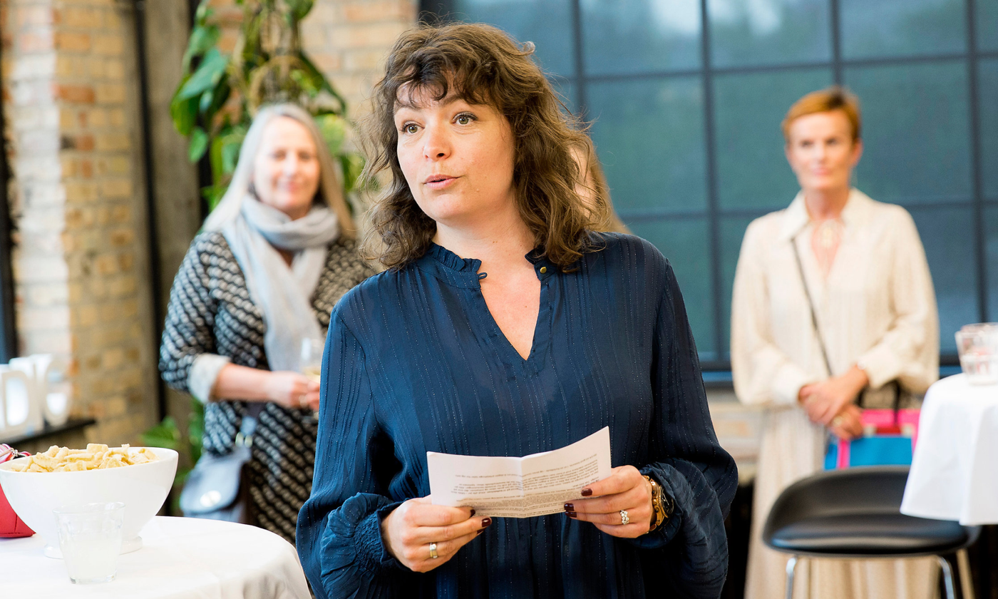 A photo of Pernille Garde Abildgaard, the Nordic expert on the four-day working week, giving a talk at a workplace