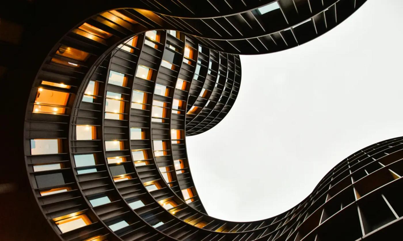 This comundo blog post about energy data as a profit engine is a worm's eye-view of the Axel Towers in Copenhagen taken from the centre of them.