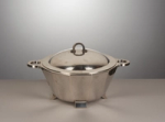 A silver centerpiece designed by the Genazzi manufacture