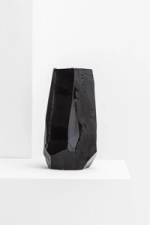 Tall, black Vase designed by the ceramic artist Franco Meneguzzo