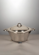 A silver centerpiece designed by the Genazzi manufacture