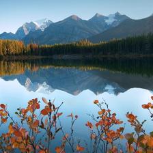 Mountains reflected in Herbert Lake on a calm autumn day