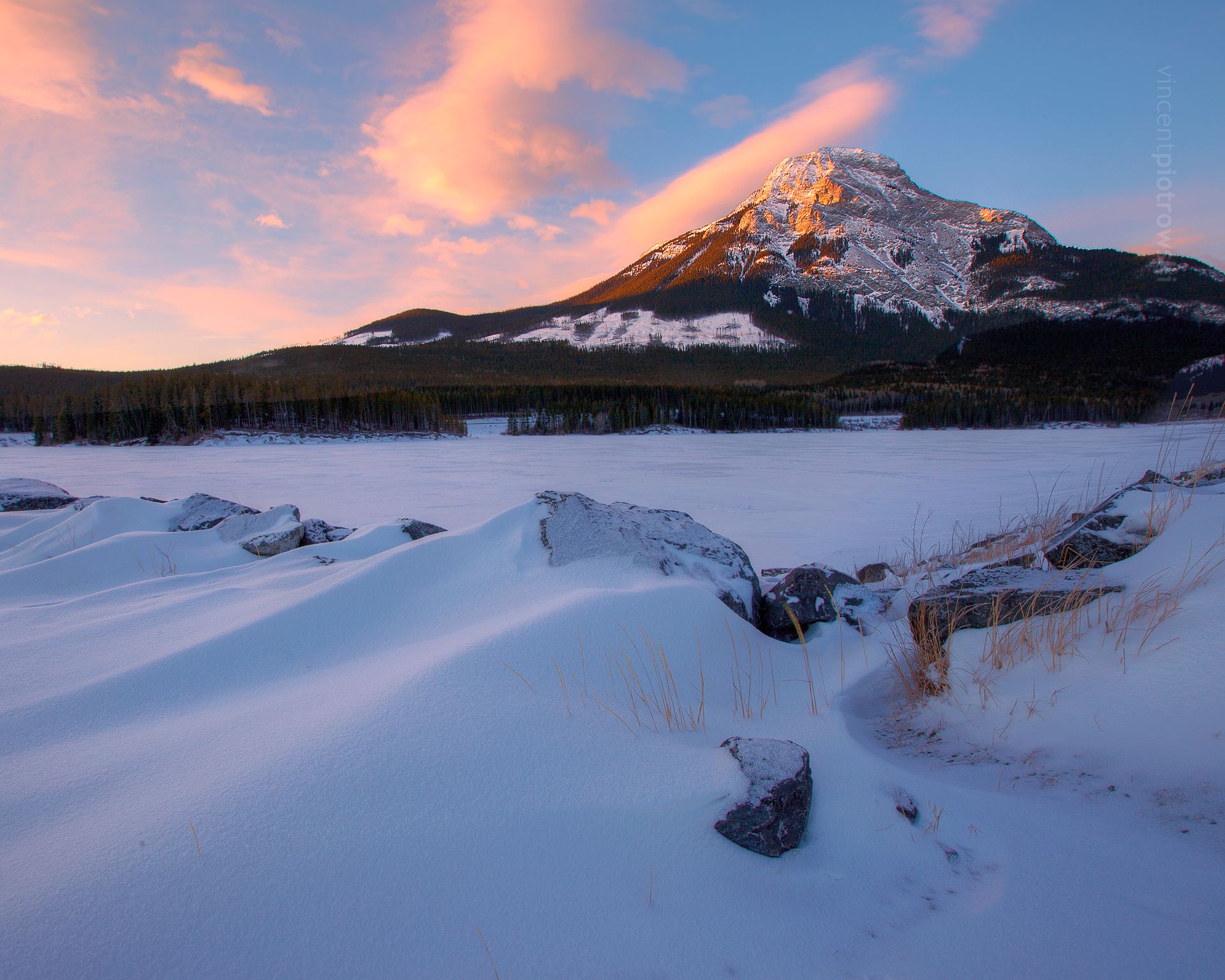 Mt Baldy at sunrise with snow drifts in the foreground