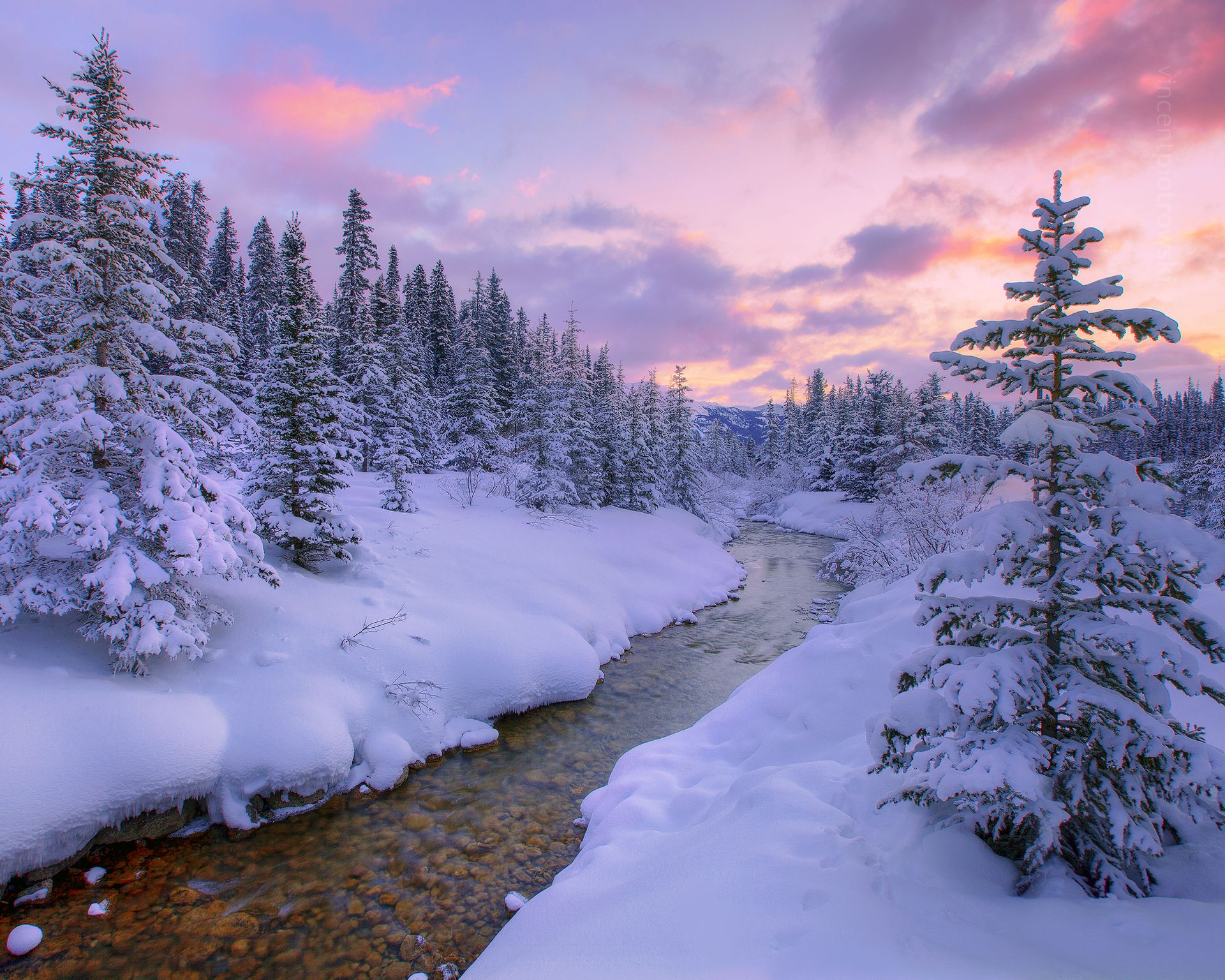 Lake Louise Creek at sunset in winter