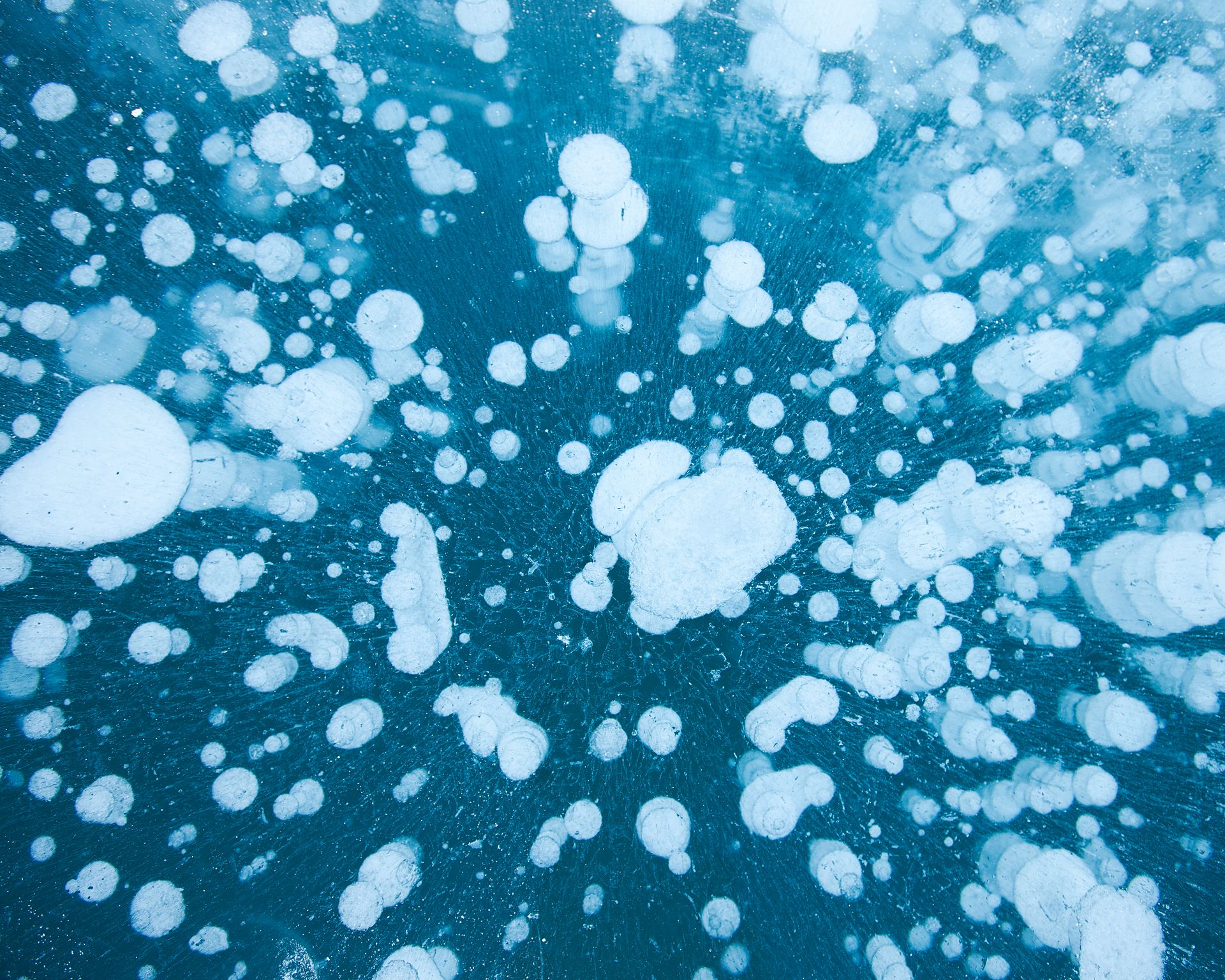 An abstract photo of the methane bubbles frozen in Abraham Lake Alberta