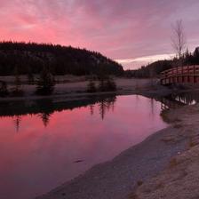 An unusually pink sunrise over Cascade Ponds near Banff