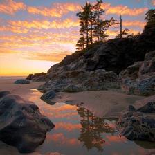 A portrait oriented photograph of striped clouds and tide pools near Tofino BC