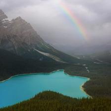 A rainbow over Peyto Lake along Icefields Parkway in Alberta