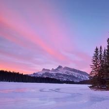 Two Jack Lake in Banff National Park in winter with Mt. Rundle in view