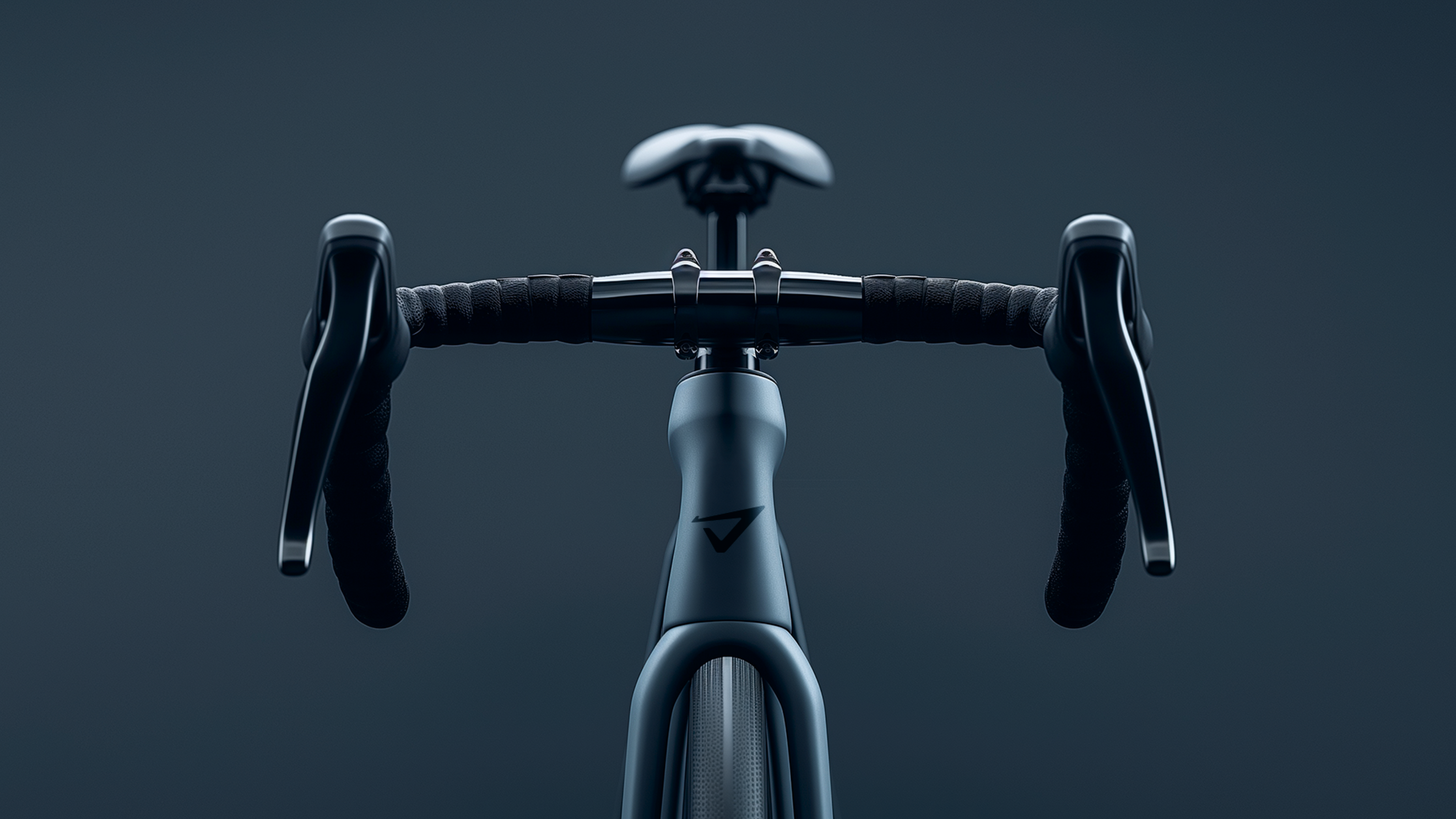 a close up of a bicycle with the letter a on the handlebars