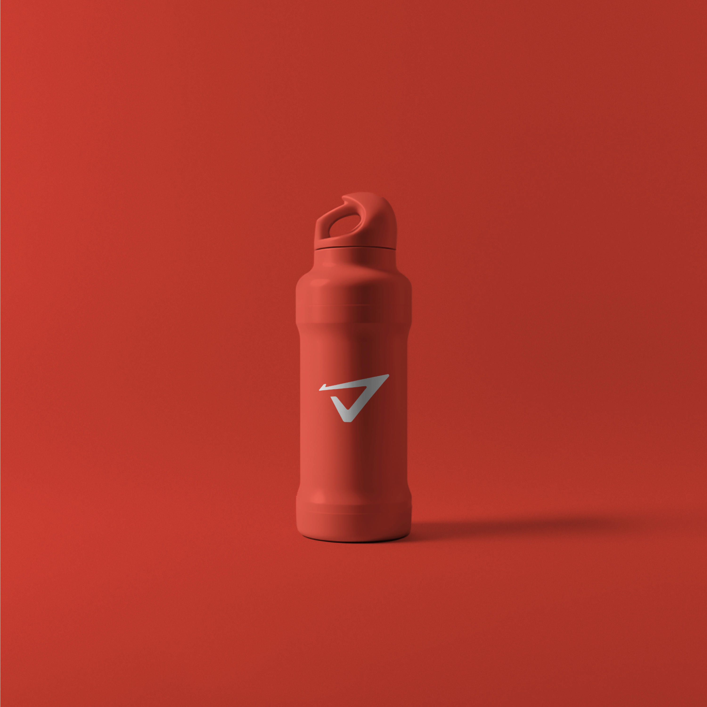 a red water bottle with the letter v on it