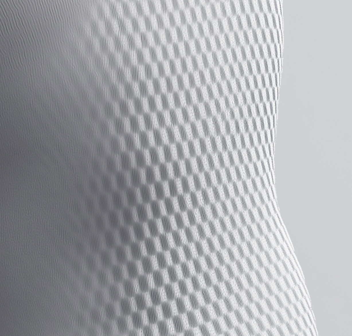 a close up of a white fabric with a pattern on it .