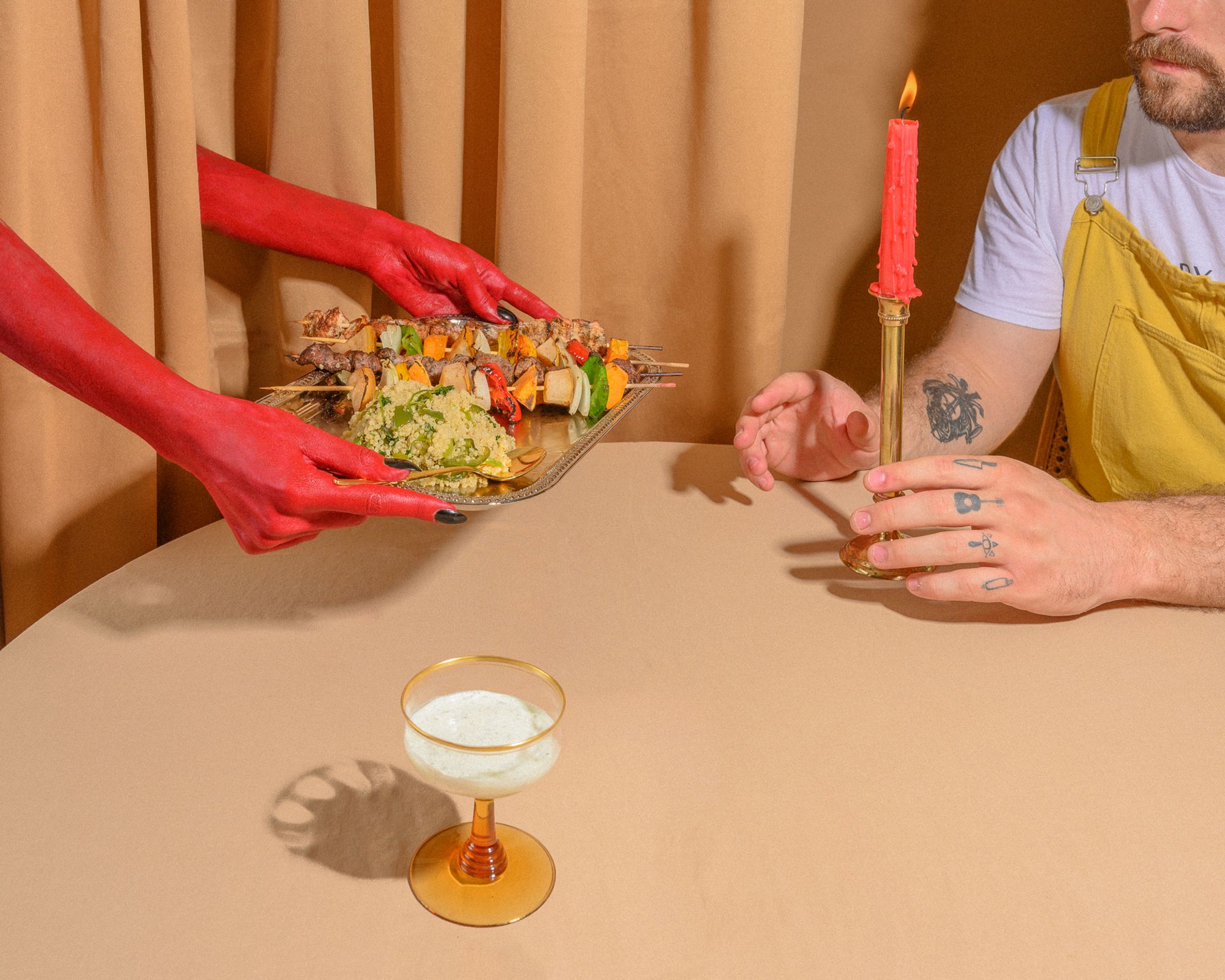 Devil Hands serving food to customer - Hungry Devils Reno Nevada