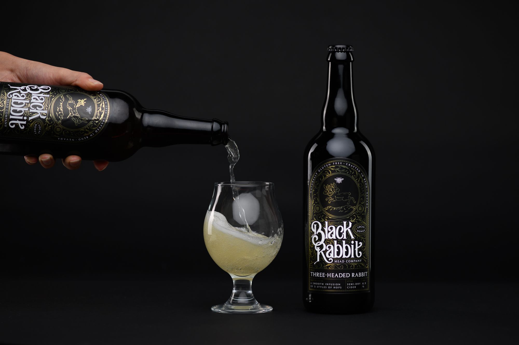 pouring black rabbit mead